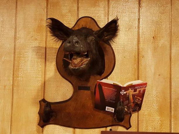 Lodge of Death boar reading P.J. Hoover's TUT.