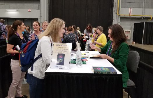Signing copies of THE BOY, THE BOAT, AND THE BEAST at TLA 2019.